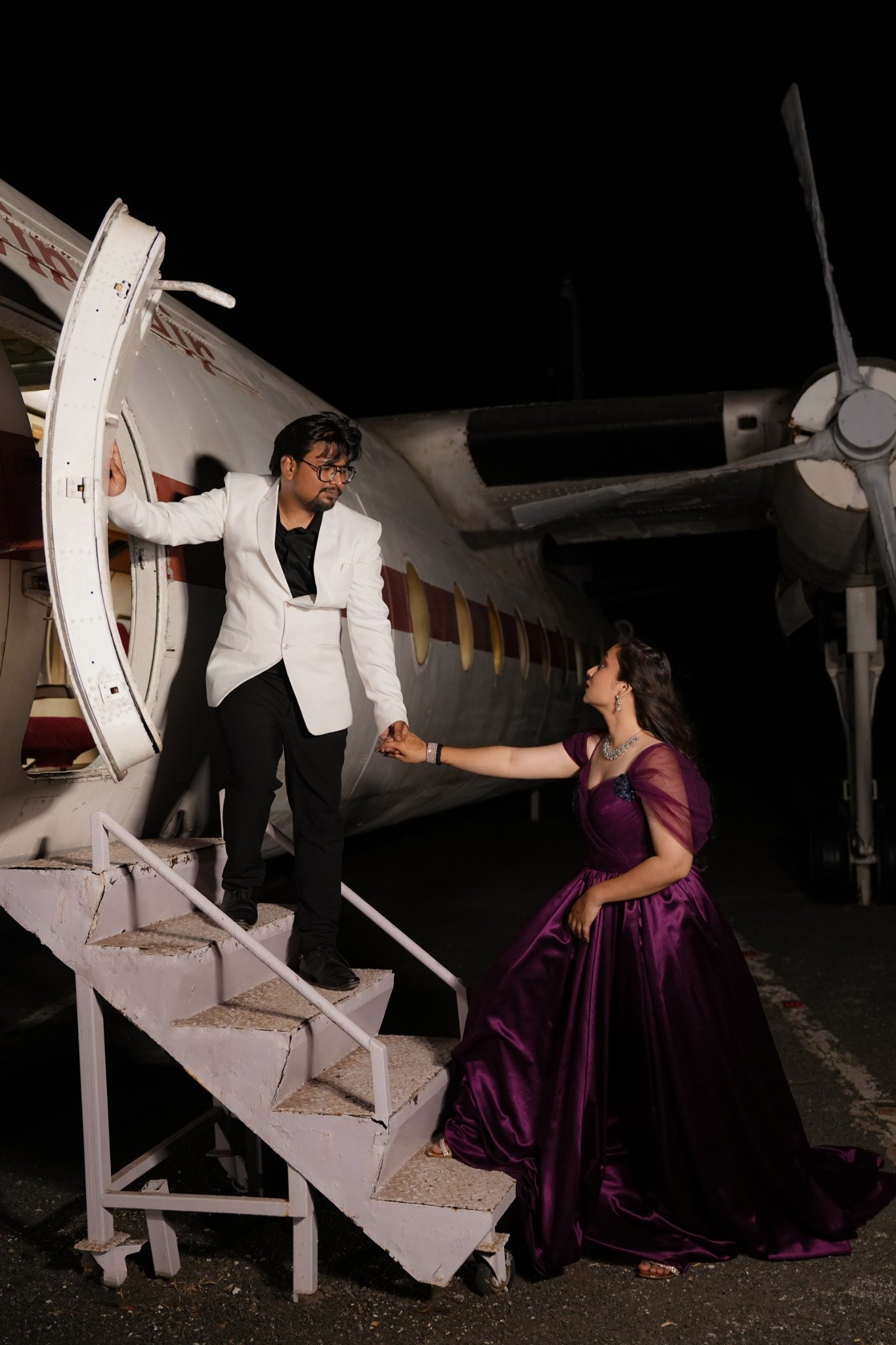 Arpit and Shivangi near an aircraft