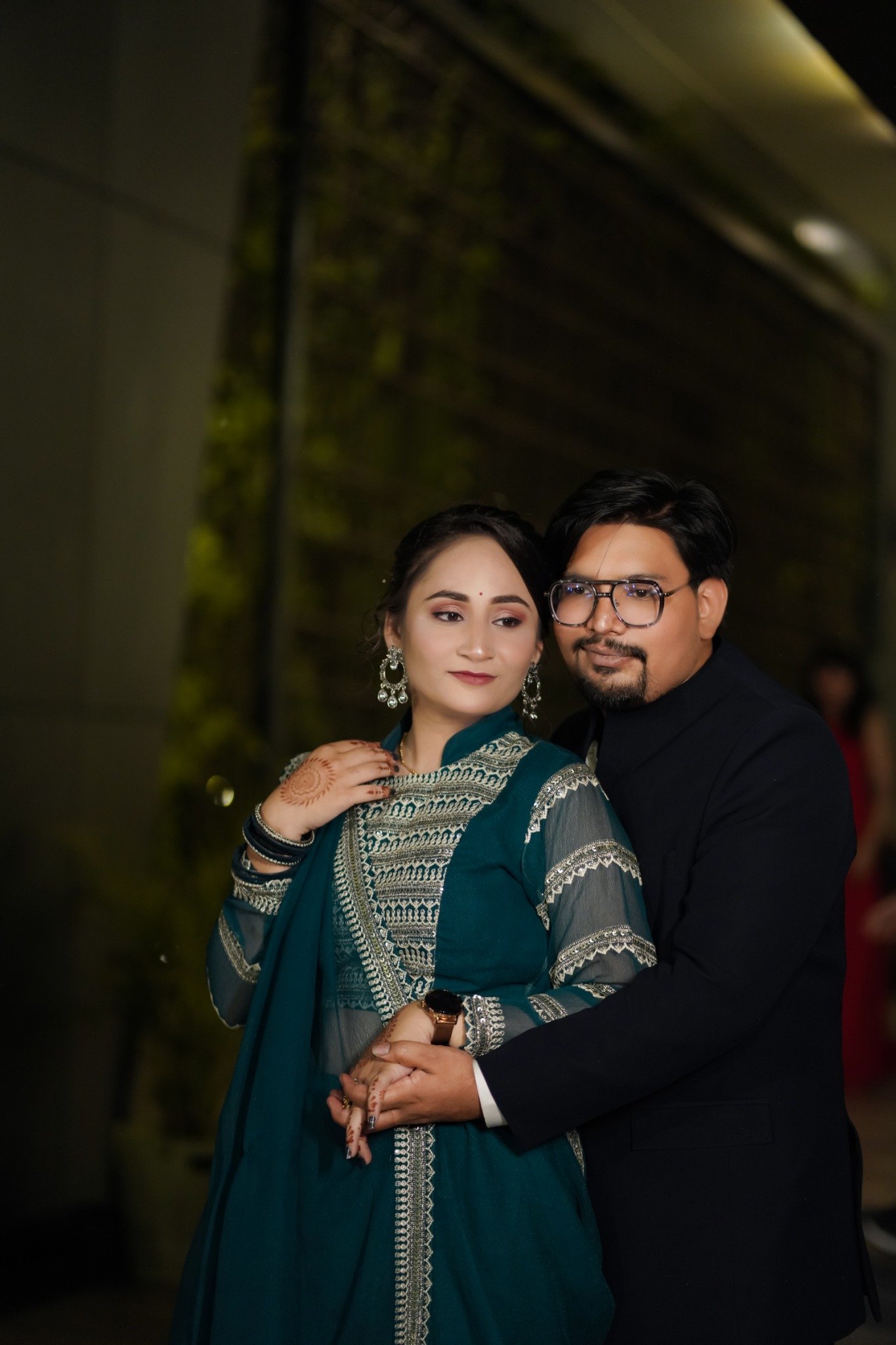 Arpit and Shivangi in teal and black outfits